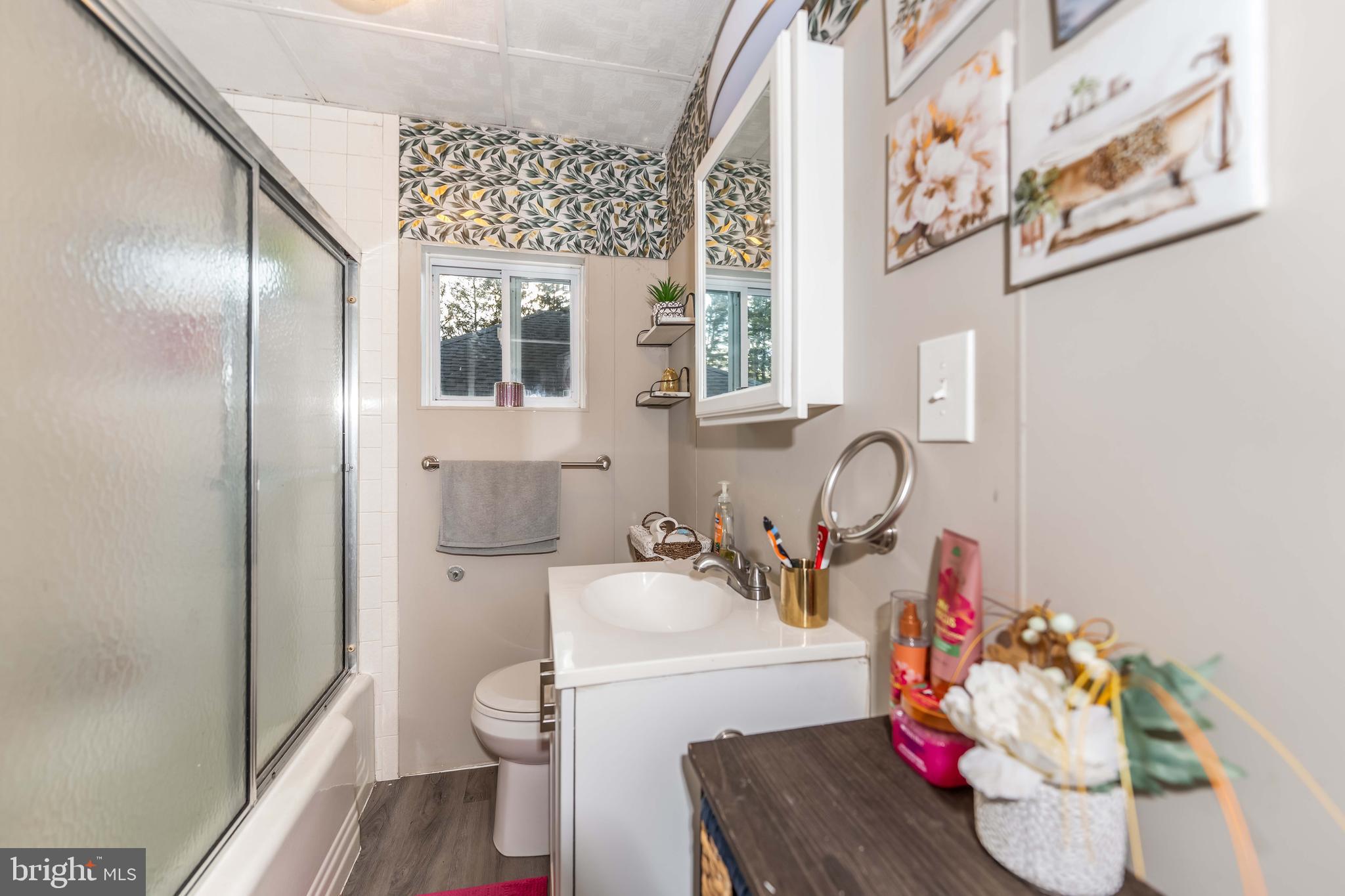 5527 Locust Street Harrisburg, PA 17112 - Photo 9 of 14 a bathroom with a sink toilet and shower