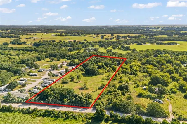 a view of an ocean and a mountain