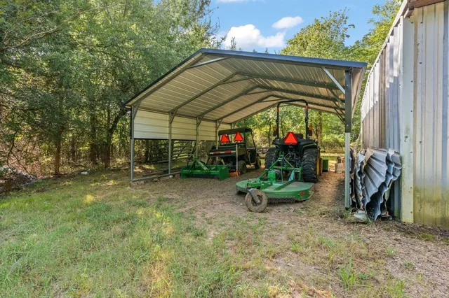 a view of a chair under an umbrella