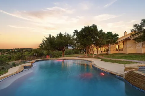 a view of an outdoor space and swimming pool