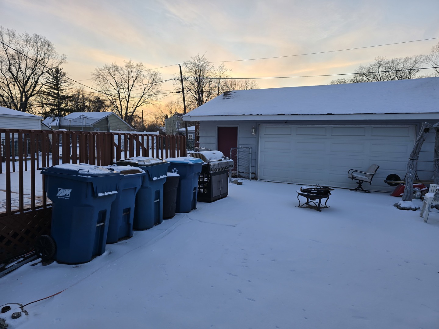 14348 Kolmar Avenue Midlothian, IL 60445 - Photo 11 of 13 a backyard of a house with barbeque oven and outdoor seating