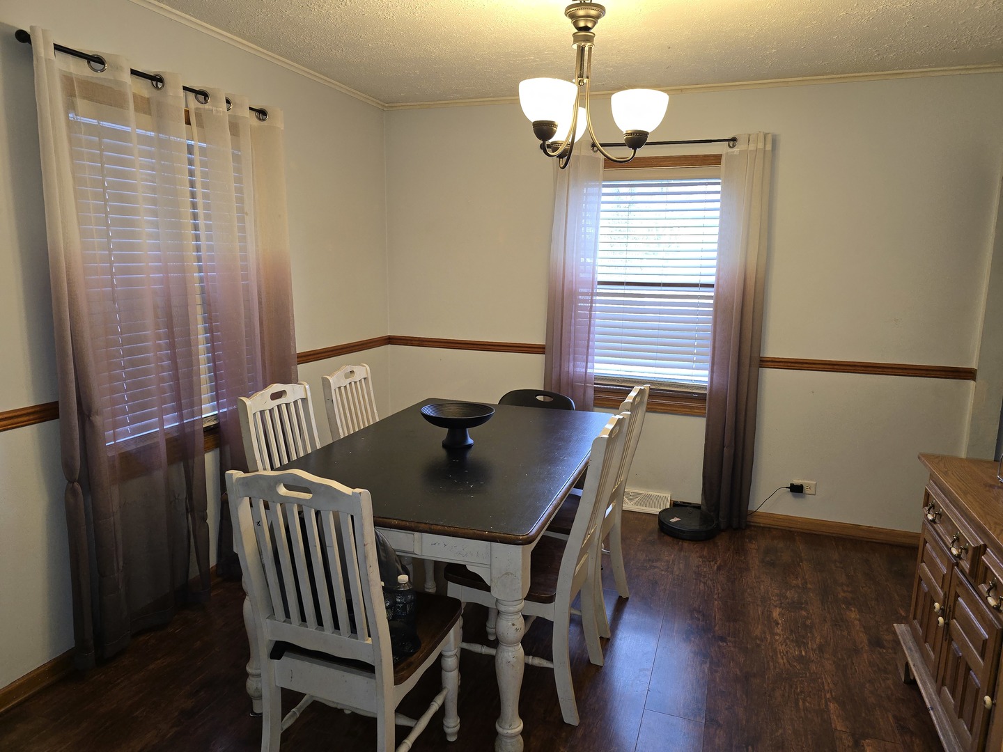 14348 Kolmar Avenue Midlothian, IL 60445 - Photo 4 of 13 a view of a dining room with furniture window and wooden floor