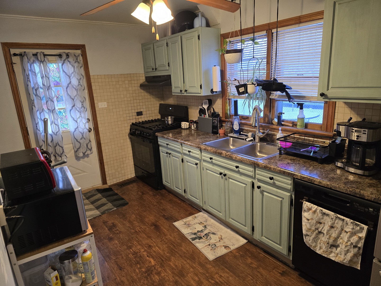 14348 Kolmar Avenue Midlothian, IL 60445 - Photo 5 of 13 a kitchen with stainless steel appliances granite countertop a sink stove and cabinets