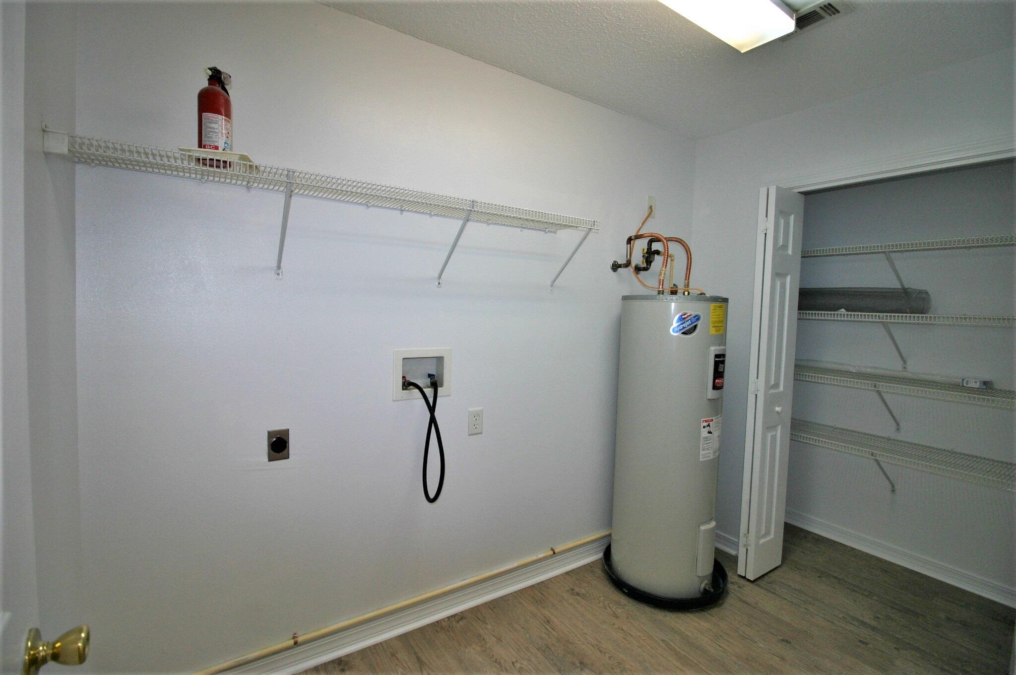 552 Brock Avenue Crestview, FL 32539 - Photo 7 of 13 a view of water heater room