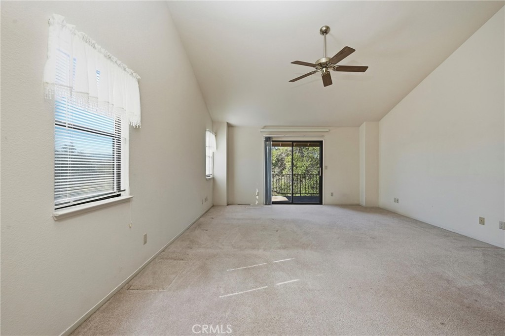 16261 Conestoga Road Hidden Valley Lake, CA 95467 - Photo 20 of 64 a view of a livingroom with a ceiling fan and window