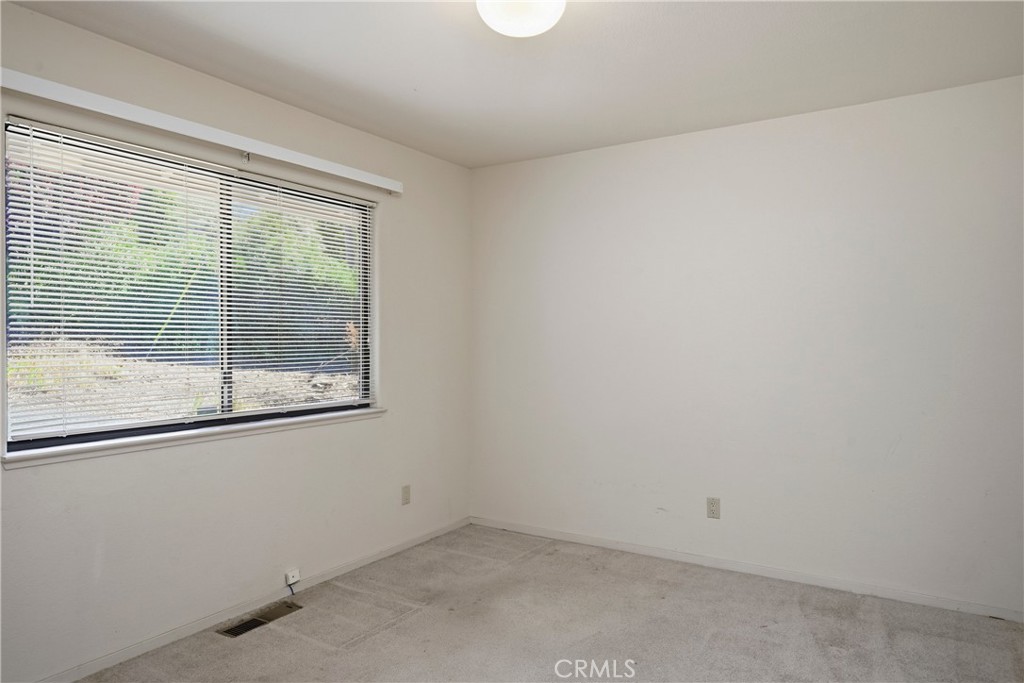 16261 Conestoga Road Hidden Valley Lake, CA 95467 - Photo 27 of 64 an empty room with a window
