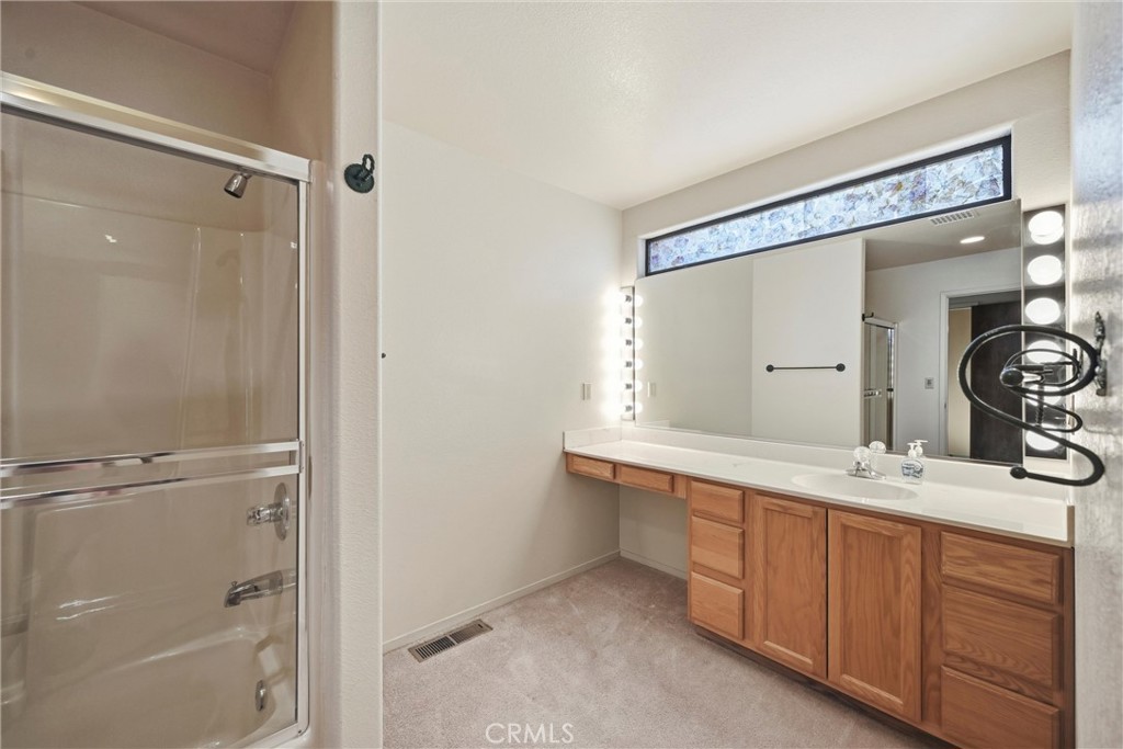 16261 Conestoga Road Hidden Valley Lake, CA 95467 - Photo 29 of 64 a bathroom with a double vanity sink mirror and double