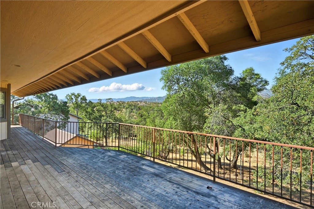 16261 Conestoga Road Hidden Valley Lake, CA 95467 - Photo 33 of 64 a view of a balcony with wooden fence