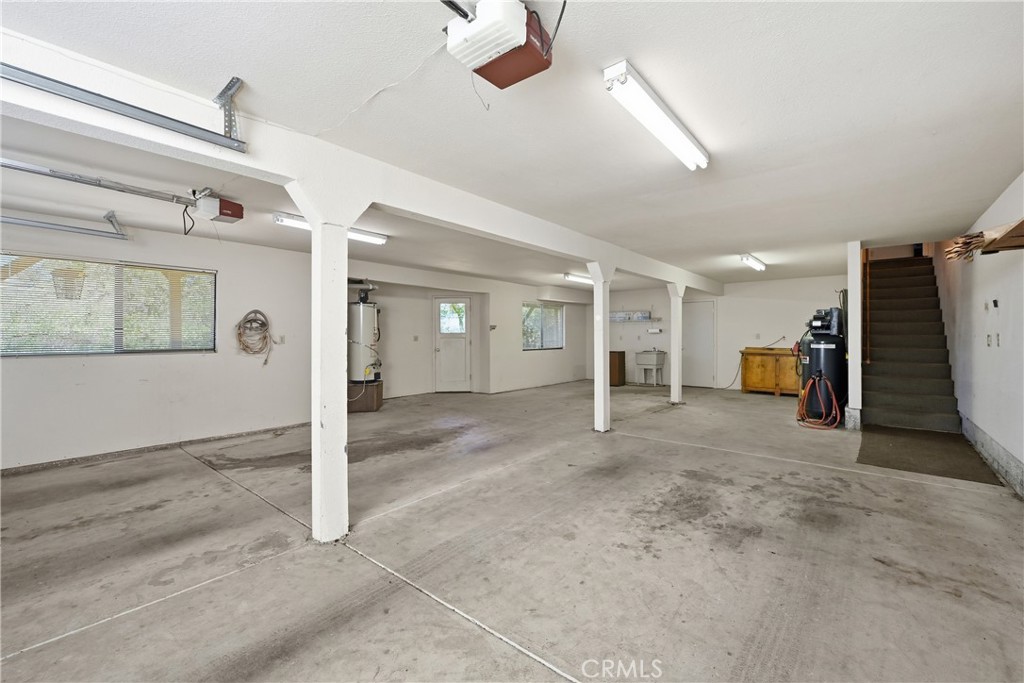 16261 Conestoga Road Hidden Valley Lake, CA 95467 - Photo 38 of 64 a view of a big room with closet and windows