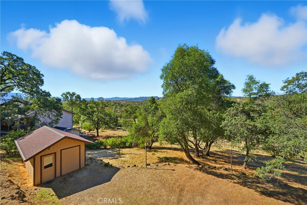 16261 Conestoga Road Hidden Valley Lake, CA 95467 - Photo 49 of 64 a view of a houses with a yard