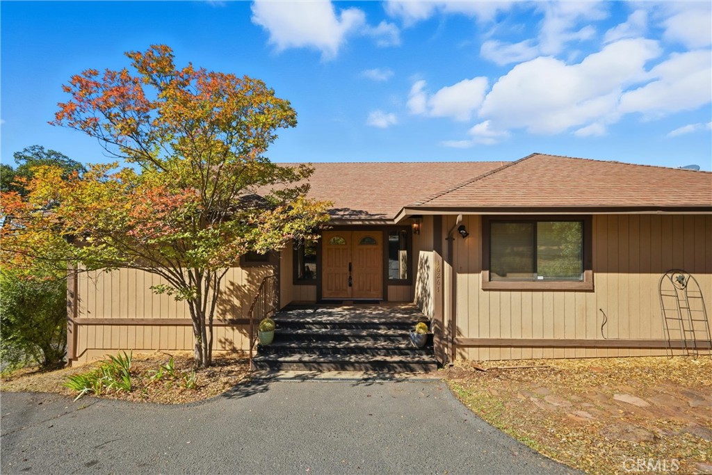 16261 Conestoga Road Hidden Valley Lake, CA 95467 - Photo 5 of 64 front view of a house with a garage
