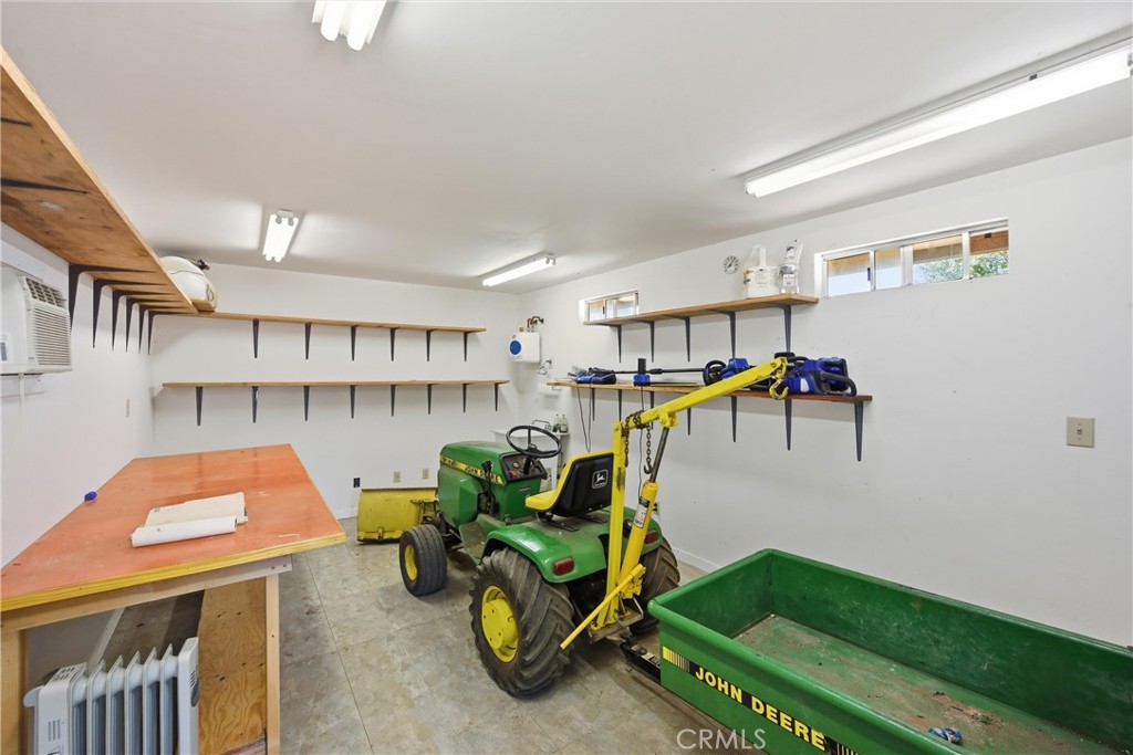 16261 Conestoga Road Hidden Valley Lake, CA 95467 - Photo 51 of 64 Tractor garage