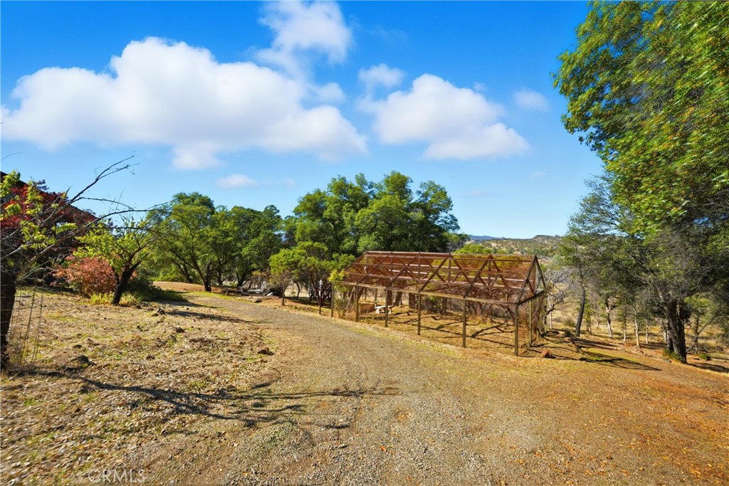 16261 Conestoga Road Hidden Valley Lake, CA 95467 - Photo 53 of 64 a view of a yard with wooden fence
