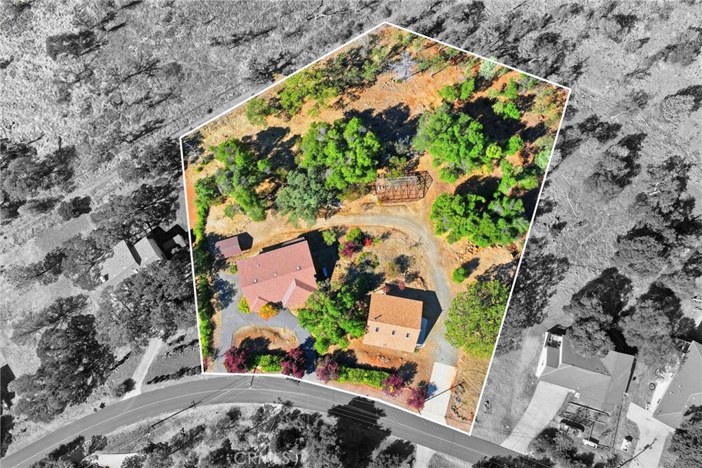 16261 Conestoga Road Hidden Valley Lake, CA 95467 - Photo 64 of 64 an aerial view of a house with a yard and a large tree