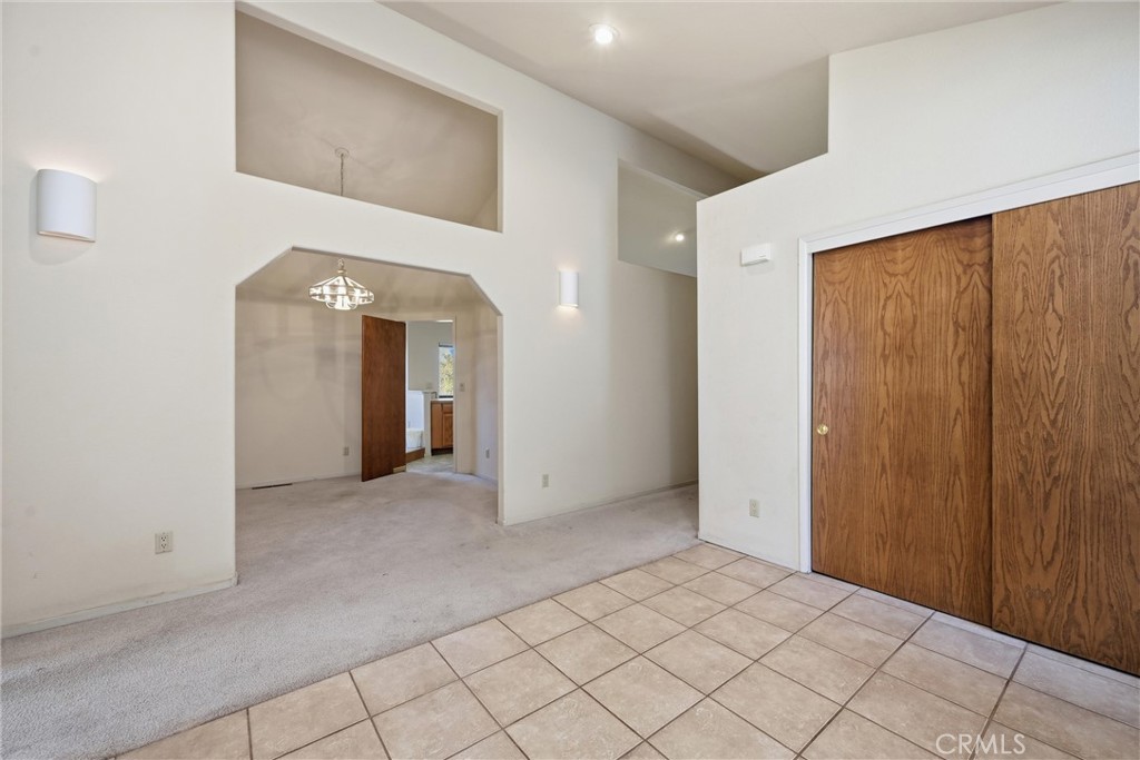 16261 Conestoga Road Hidden Valley Lake, CA 95467 - Photo 8 of 64 a view of a hallway with wooden shelves