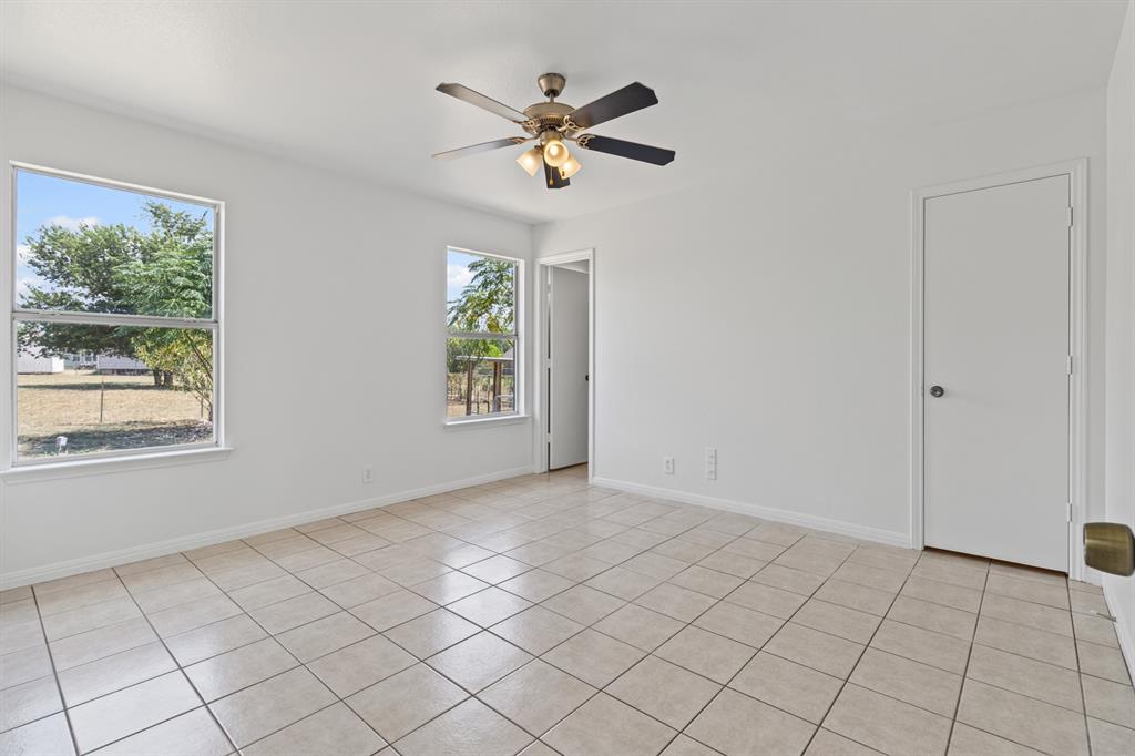 207 Panther Path Liberty Hill, TX 78642 - Photo 13 of 19 a view of an empty room and window