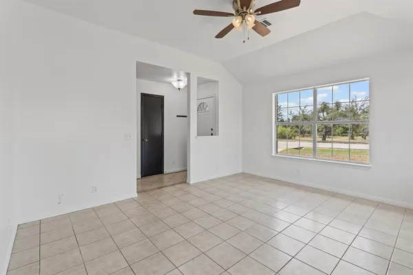 a view of an empty room with window
