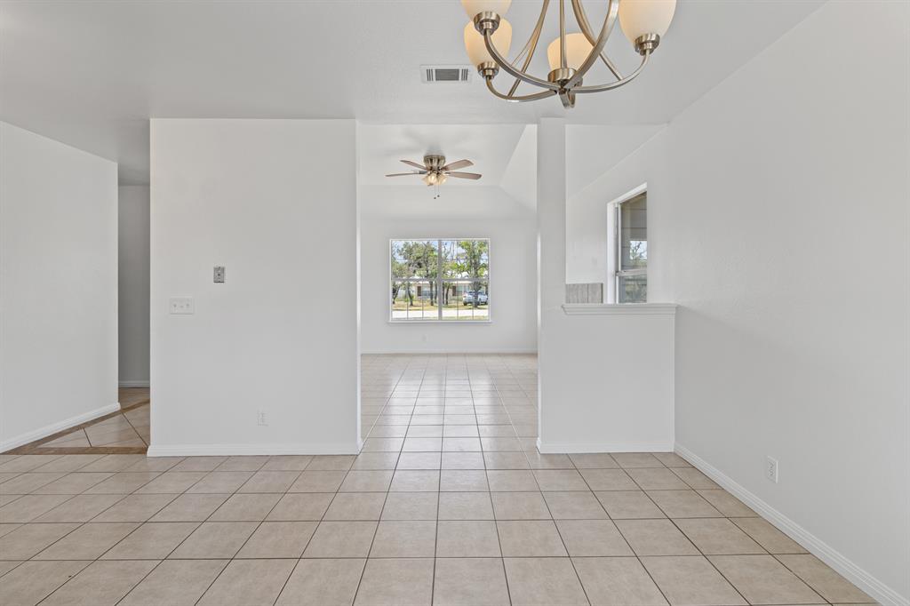 207 Panther Path Liberty Hill, TX 78642 - Photo 6 of 19 a view of an empty room and window