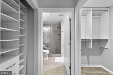 a view of a bathroom from a hallway with toilet