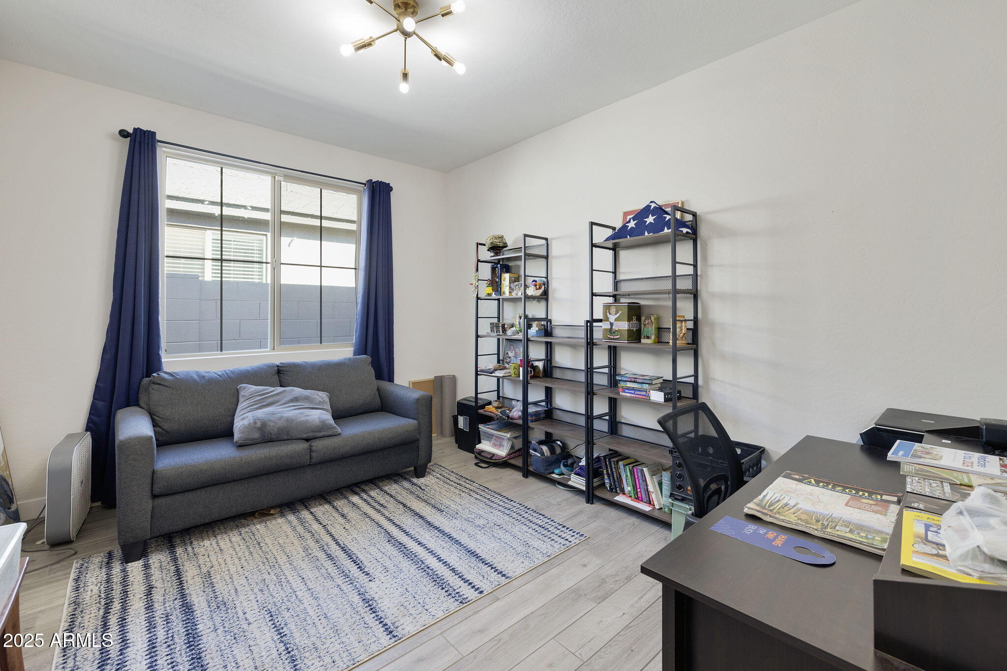 4557 South Element Mesa, AZ 85212 - Photo 15 of 34 a living room with furniture and wooden floor