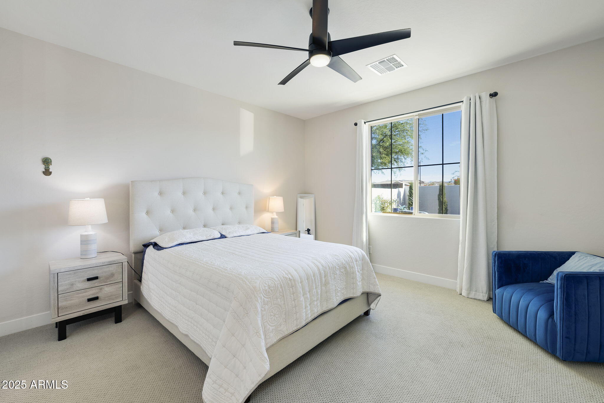 4557 South Element Mesa, AZ 85212 - Photo 17 of 34 a bedroom with a bed and a window