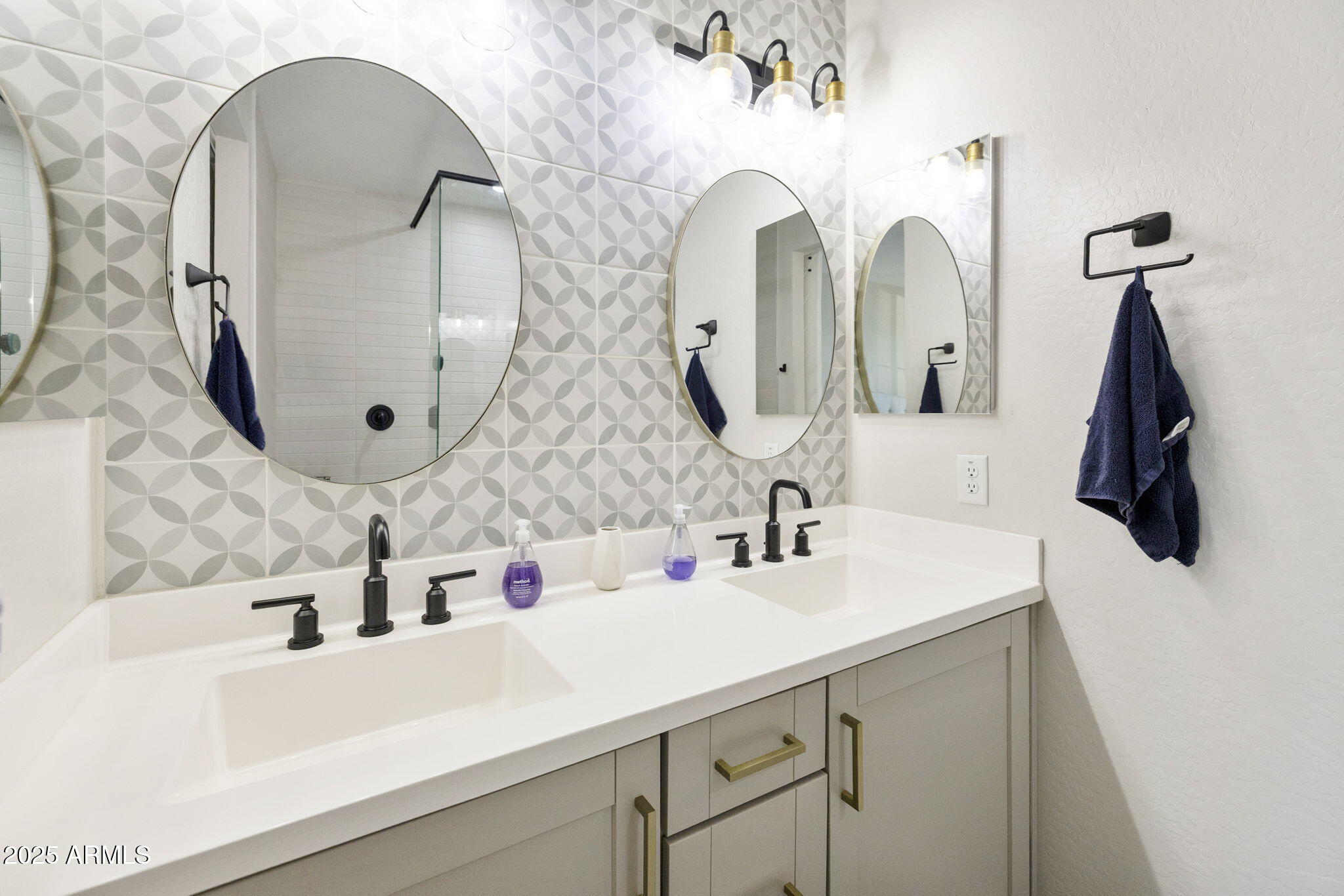 4557 South Element Mesa, AZ 85212 - Photo 19 of 34 a bathroom with double vanity sink and two mirror