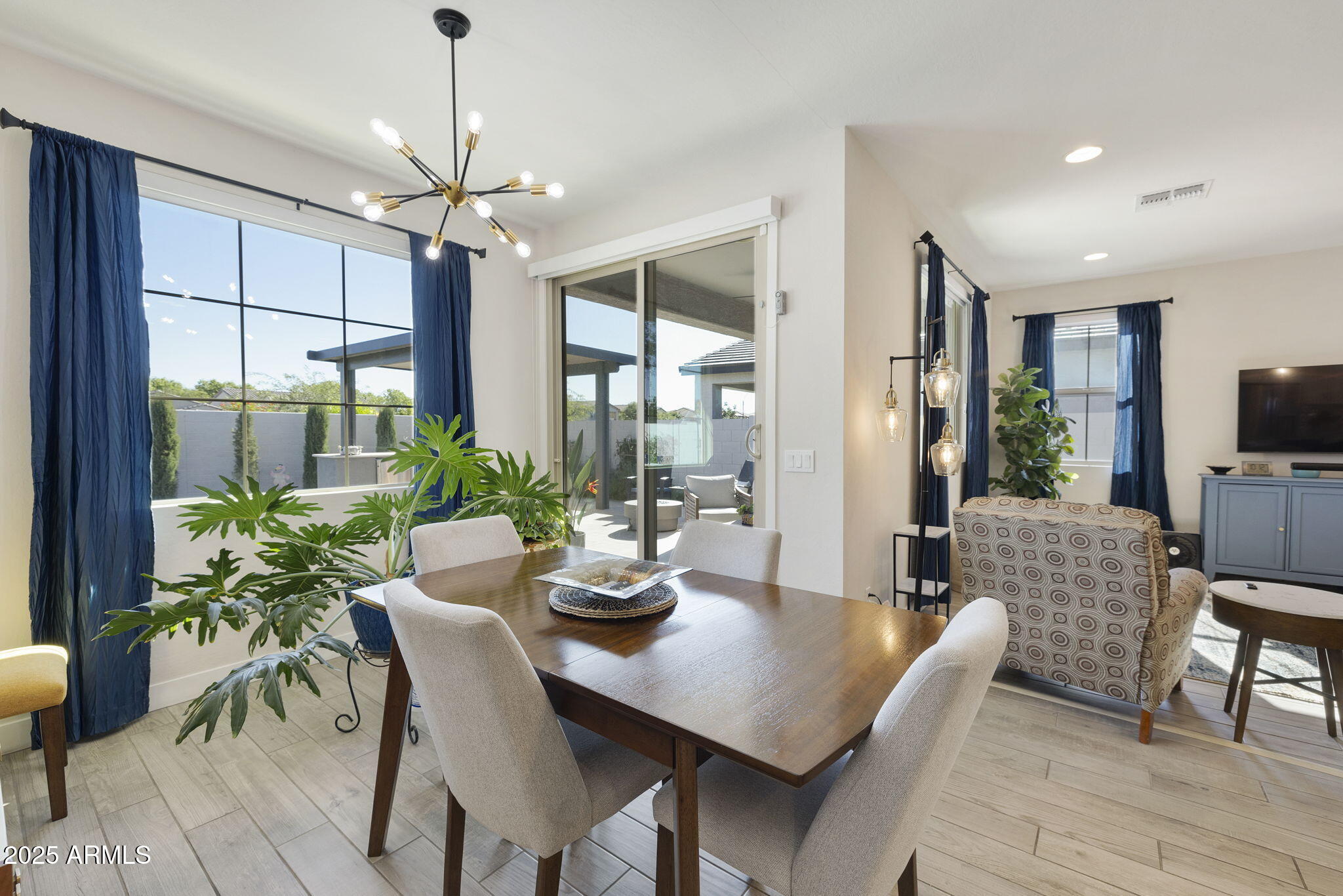 4557 South Element Mesa, AZ 85212 - Photo 21 of 34 a view of a dining room with furniture window and outside view
