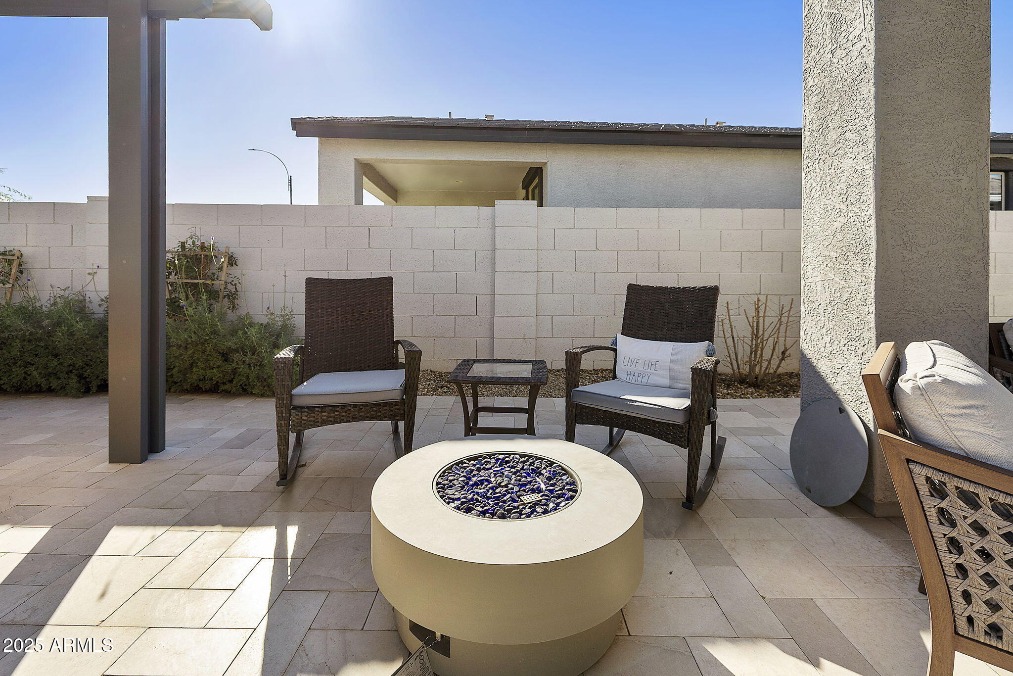 4557 South Element Mesa, AZ 85212 - Photo 27 of 34 a view of a patio with a dining table and chairs