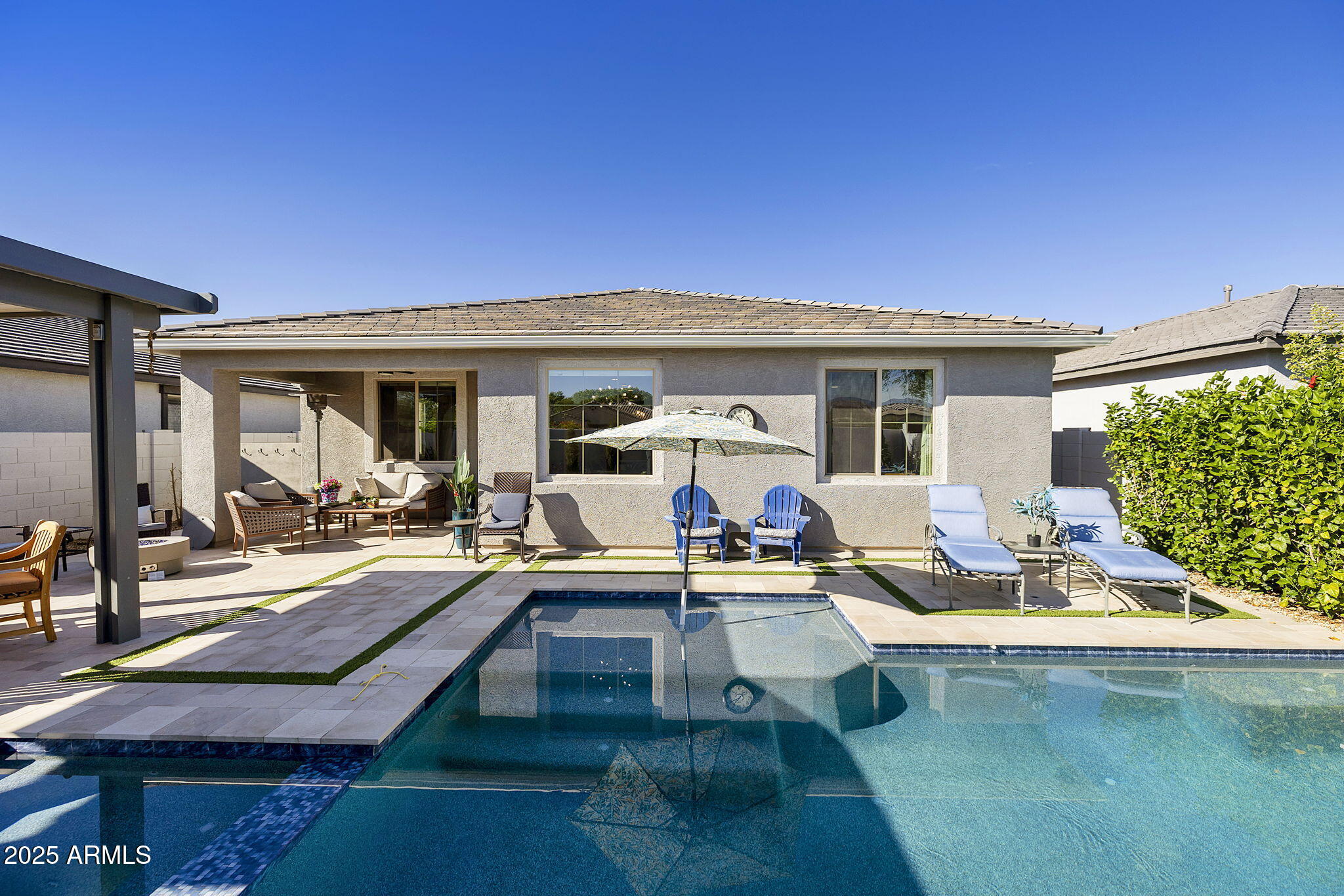 4557 South Element Mesa, AZ 85212 - Photo 31 of 34 a view of a house with pool porch and furniture