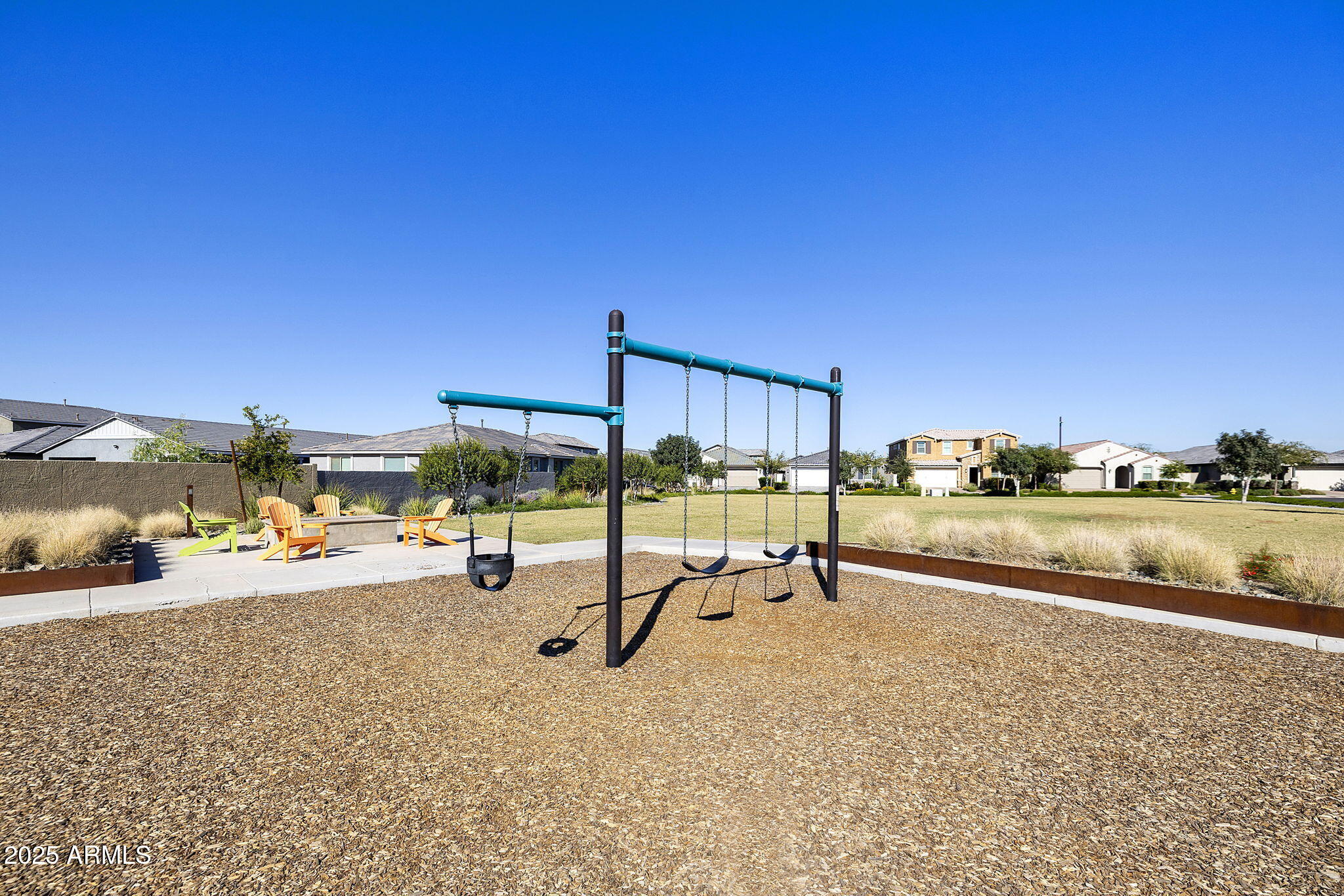 4557 South Element Mesa, AZ 85212 - Photo 33 of 34 a view of a swimming pool and lounge chair