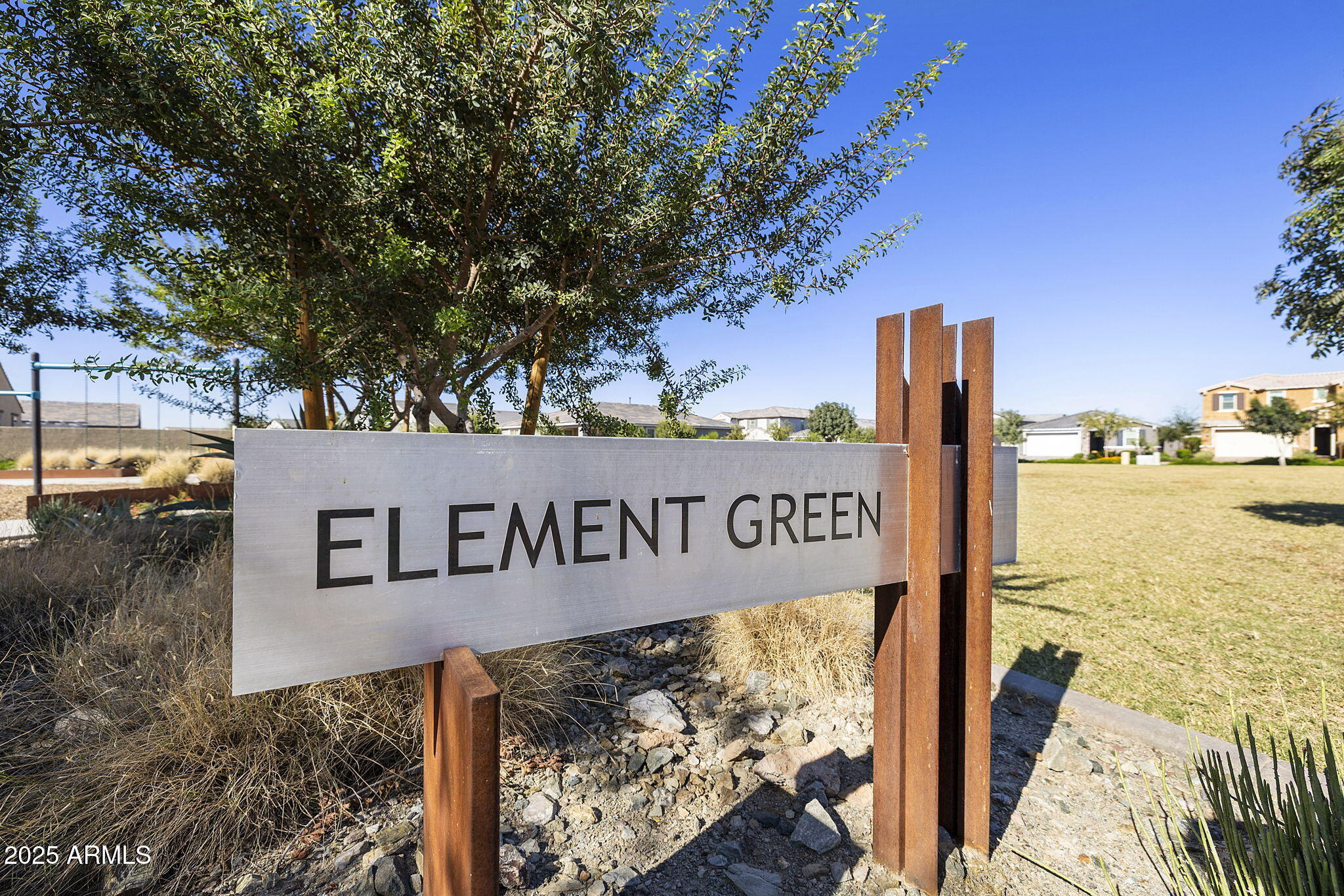 4557 South Element Mesa, AZ 85212 - Photo 34 of 34 a street sign on a pole on a road