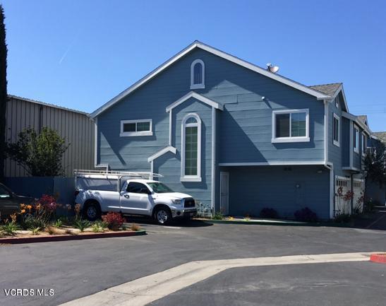 476 West Wooley Road Oxnard, CA 93030 - Photo 1 of 1 a front view of a house with a yard