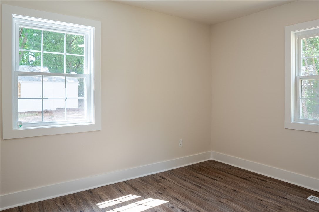 1312 Rocky Brook Road Opelika, AL 36801 - Photo 19 of 45 This bright room features beautiful flooring and abundant natural light, creating an inviting atmosphere.