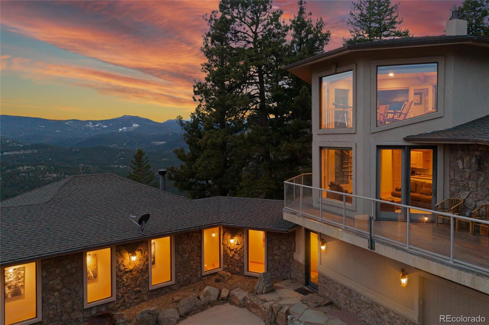 25580 Sunset Lane Evergreen, CO 80439 - Photo 5 of 40 a view of swimming pool with a balcony