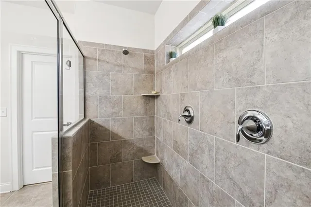 a view of a livingroom with furniture and a window