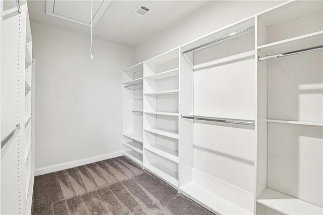 a bathroom with a sink vanity and a mirror