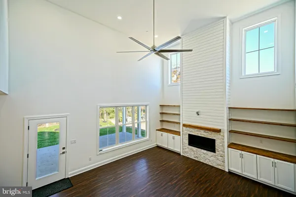 a kitchen with stainless steel appliances granite countertop a stove and a sink