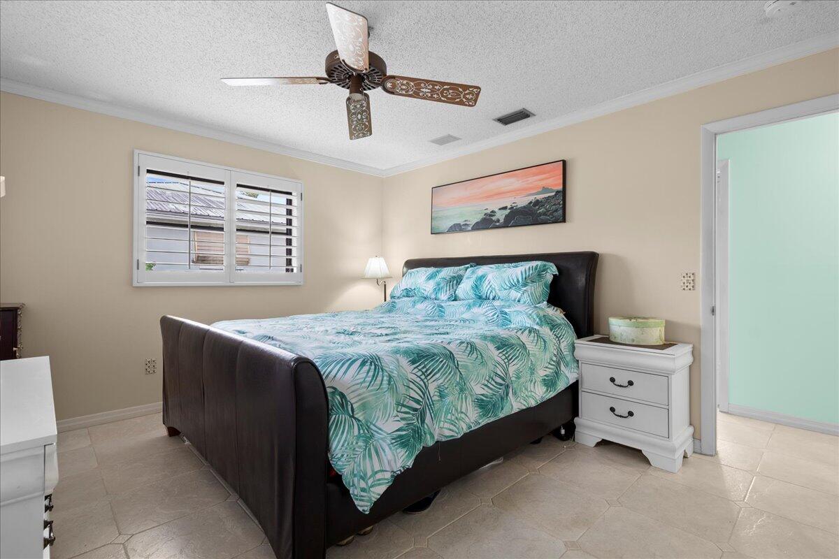441 Davis Road Palm Springs, FL 33461 - Photo 13 of 29 Primary Bedroom
