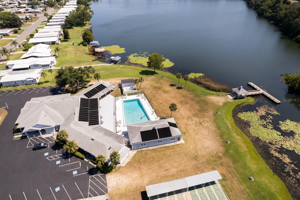 1543 Apache Circle Tavares, FL 32778 - Photo 16 of 19 an aerial view of a house with a swimming pool