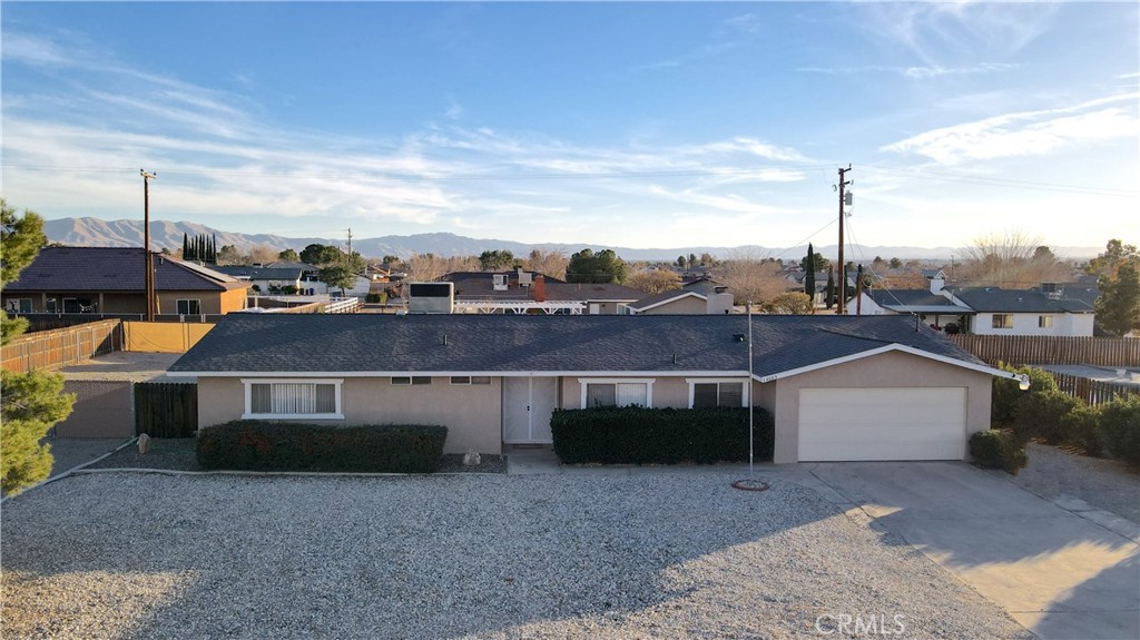 14085 Tehachapi Road Apple Valley, CA 92307 - Photo 1 of 1 a view of a city from a terrace