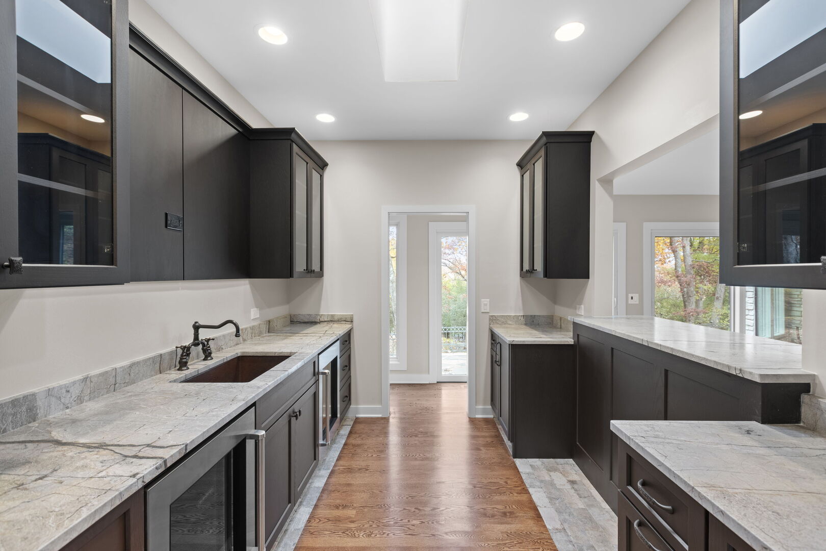 12 Rock Ridge Lane Barrington Hills, IL 60010 - Photo 14 of 52 a kitchen with granite countertop a sink and cabinets