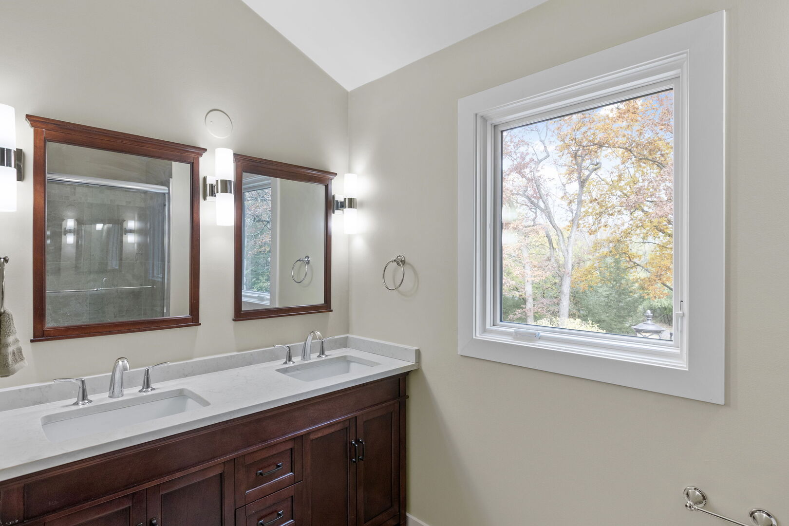 12 Rock Ridge Lane Barrington Hills, IL 60010 - Photo 17 of 52 a bathroom with a granite countertop sink a large mirror a and window
