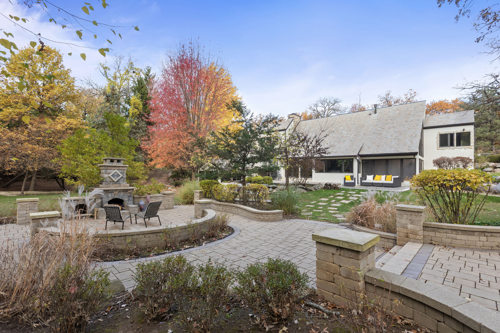 12 Rock Ridge Lane Barrington Hills, IL 60010 - Photo 37 of 52 a view of a house with backyard and sitting area