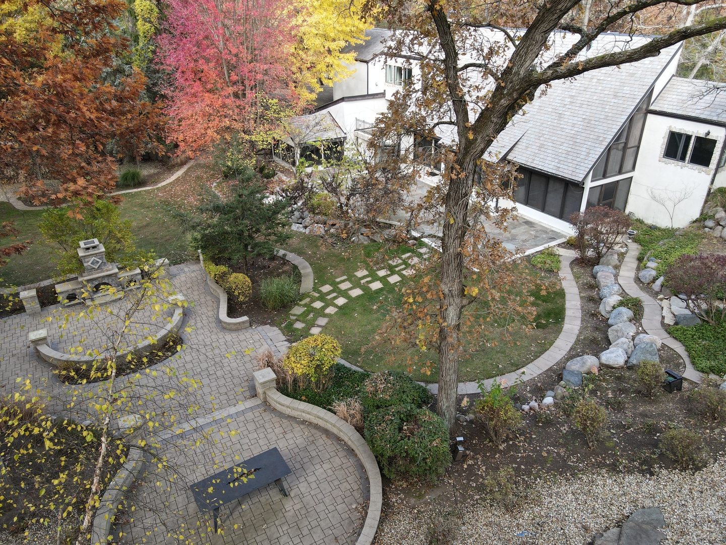 12 Rock Ridge Lane Barrington Hills, IL 60010 - Photo 4 of 52 an aerial view of a house with a yard basket ball court and outdoor seating