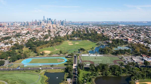 an aerial view of a city with lots of residential buildings