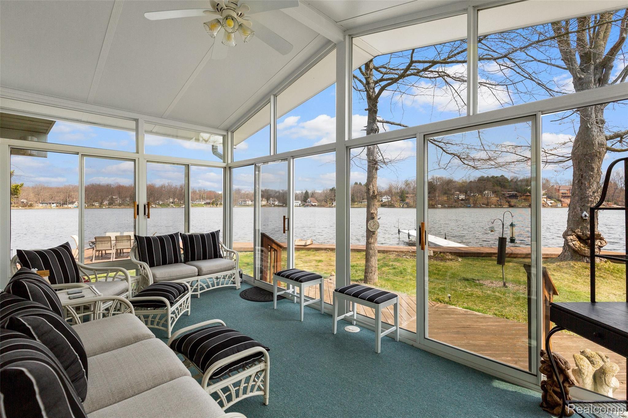 7784 Tipsico Lake Road Holly, MI 48442 - Photo 9 of 55 Light filled sunroom
