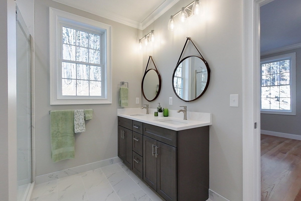 531 Clark Street Gardner, MA 01440 - Photo 19 of 42 a bathroom with a sink and a mirror