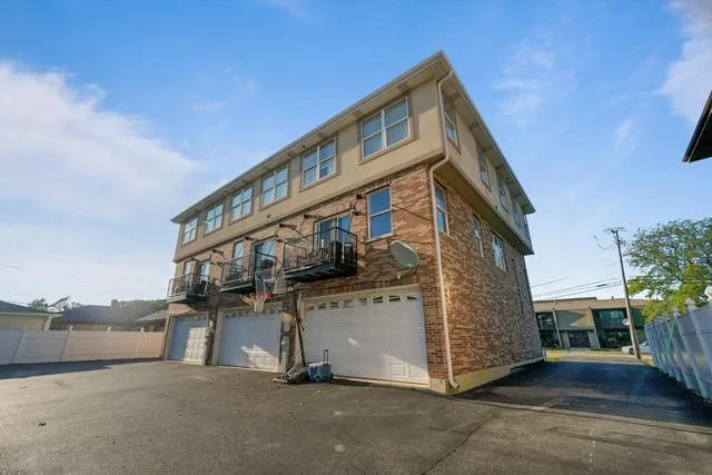 a view of a house with a street