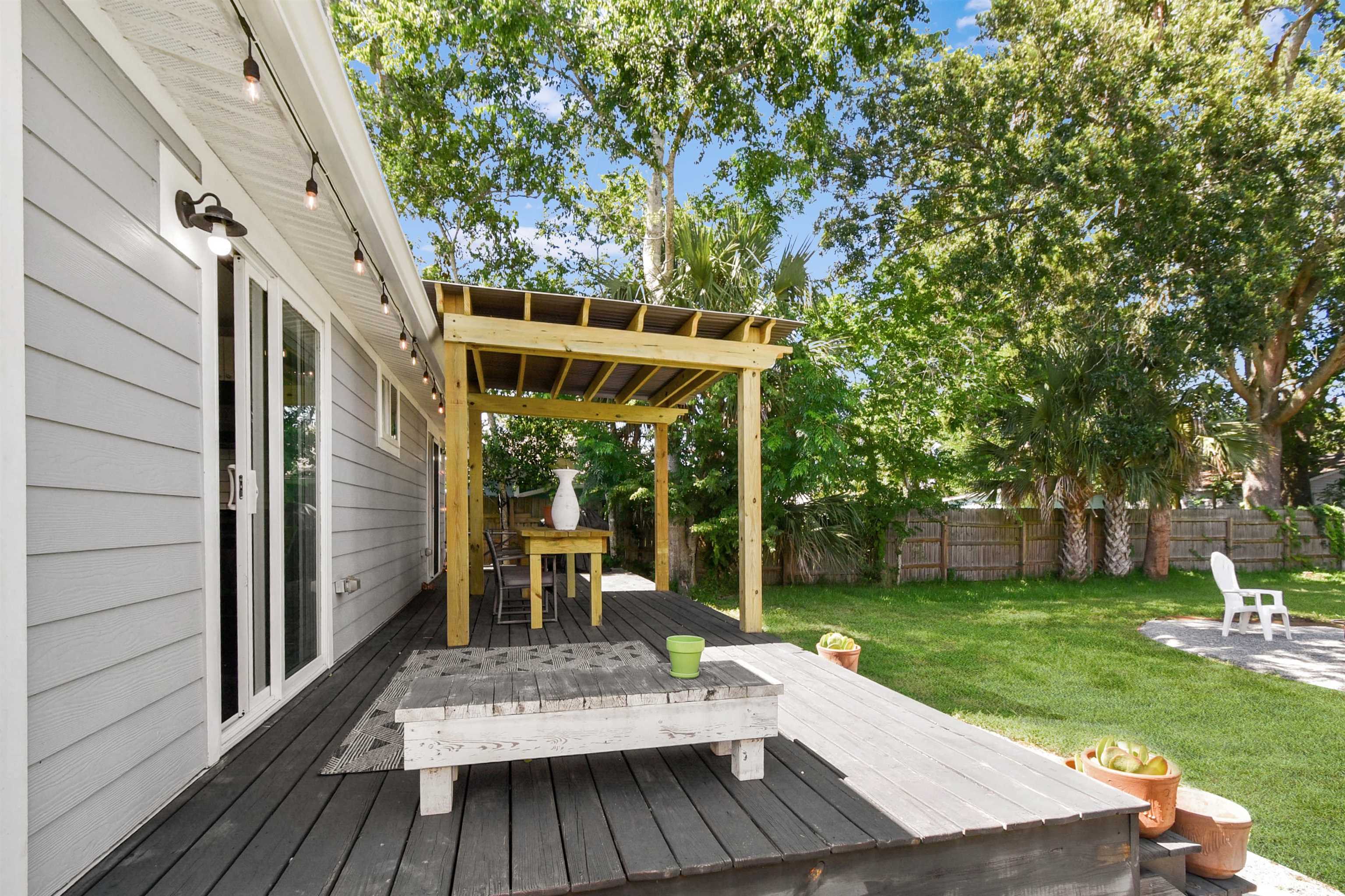 207 Spring Street St. Augustine, FL 32084 - Photo 12 of 32 a view of deck with patio