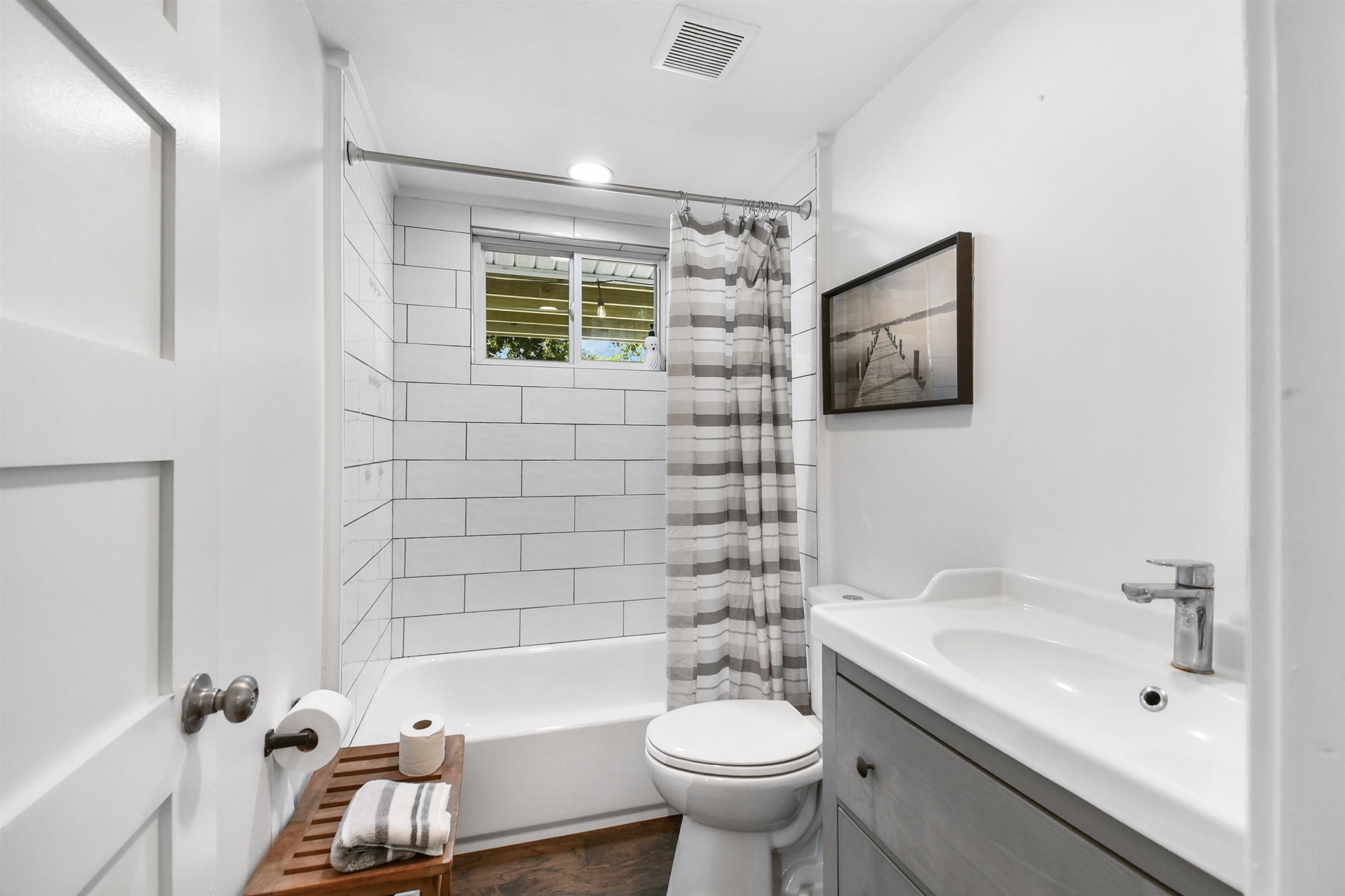 207 Spring Street St. Augustine, FL 32084 - Photo 21 of 32 a bathroom with a sink and a bathtub